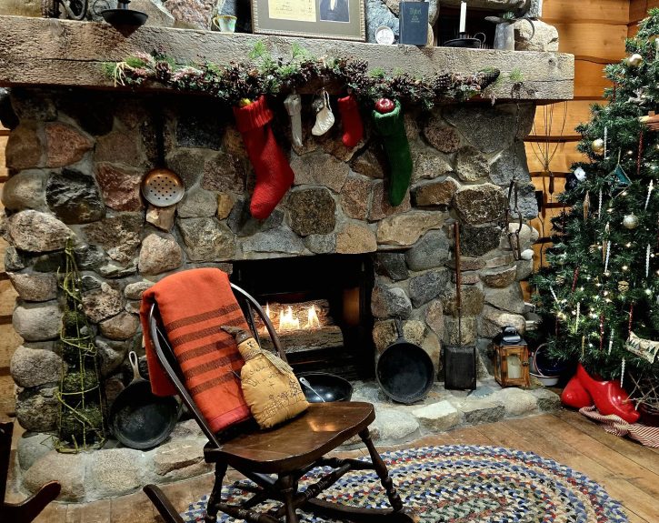 Visit the Tuttle Log Cabin at Christmas and take a family selfie.